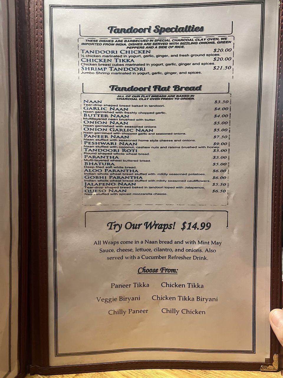 Indian specialties listed beside pizza options